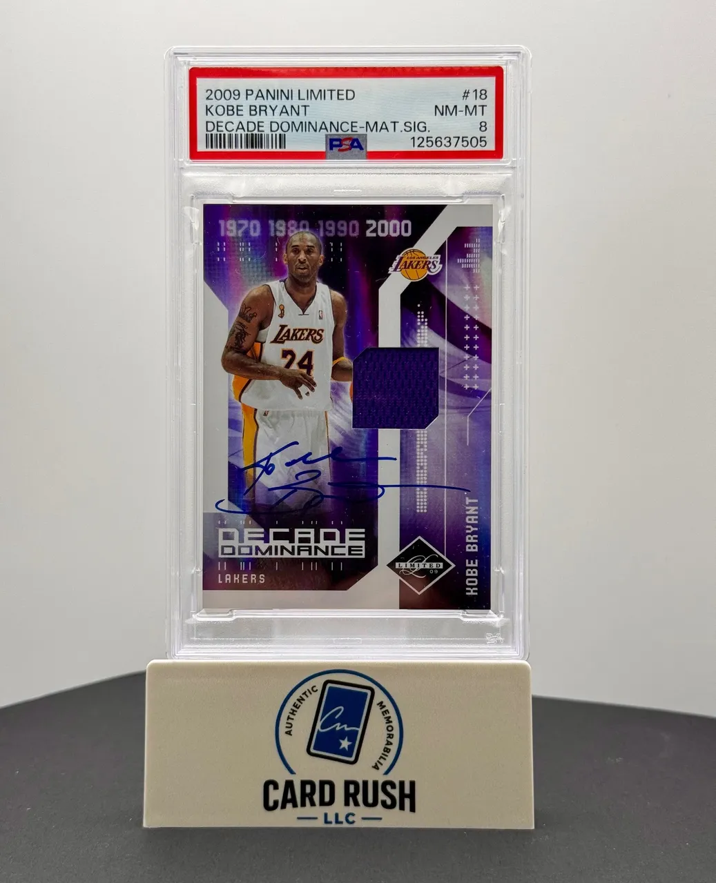 Slabbed Kobe Bryant Decade Dominance on-card autograph patch card